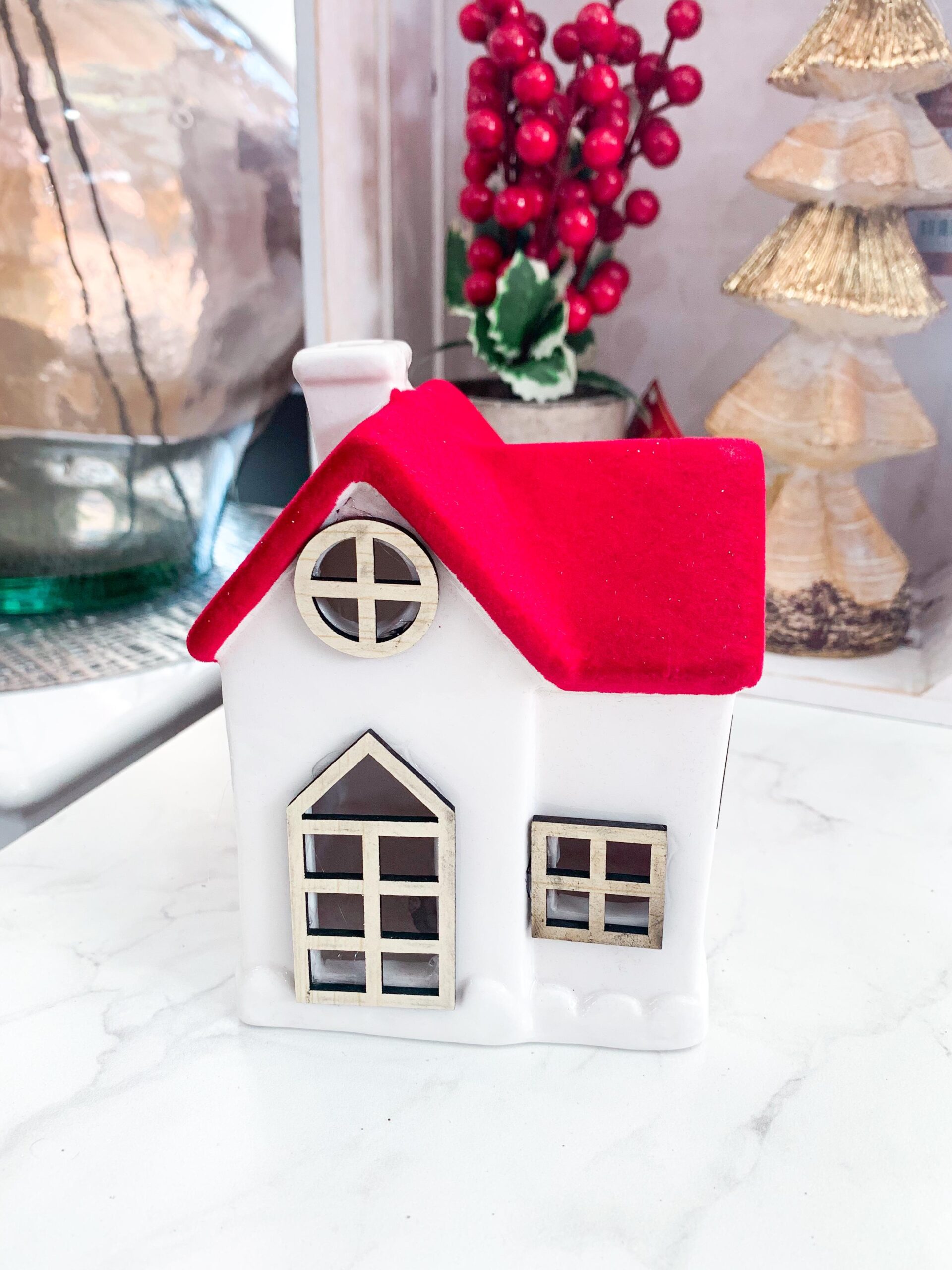 Red and White Ceramic Christmas House